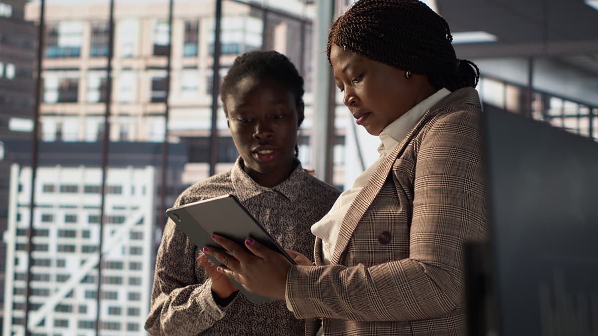 Telecom training session with African professionals in a modern learning environment